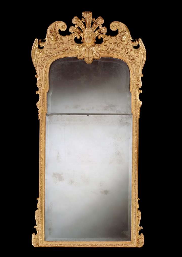 A GEORGE I GILTWOOD PIER GLASS